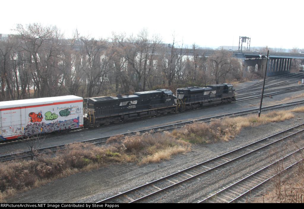 NS 1004 leads a train into Enola yard